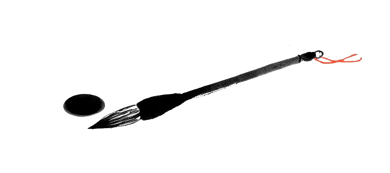 An ink-painted calligraphy brush lies at rest beside a small pool of ink on pale paper.